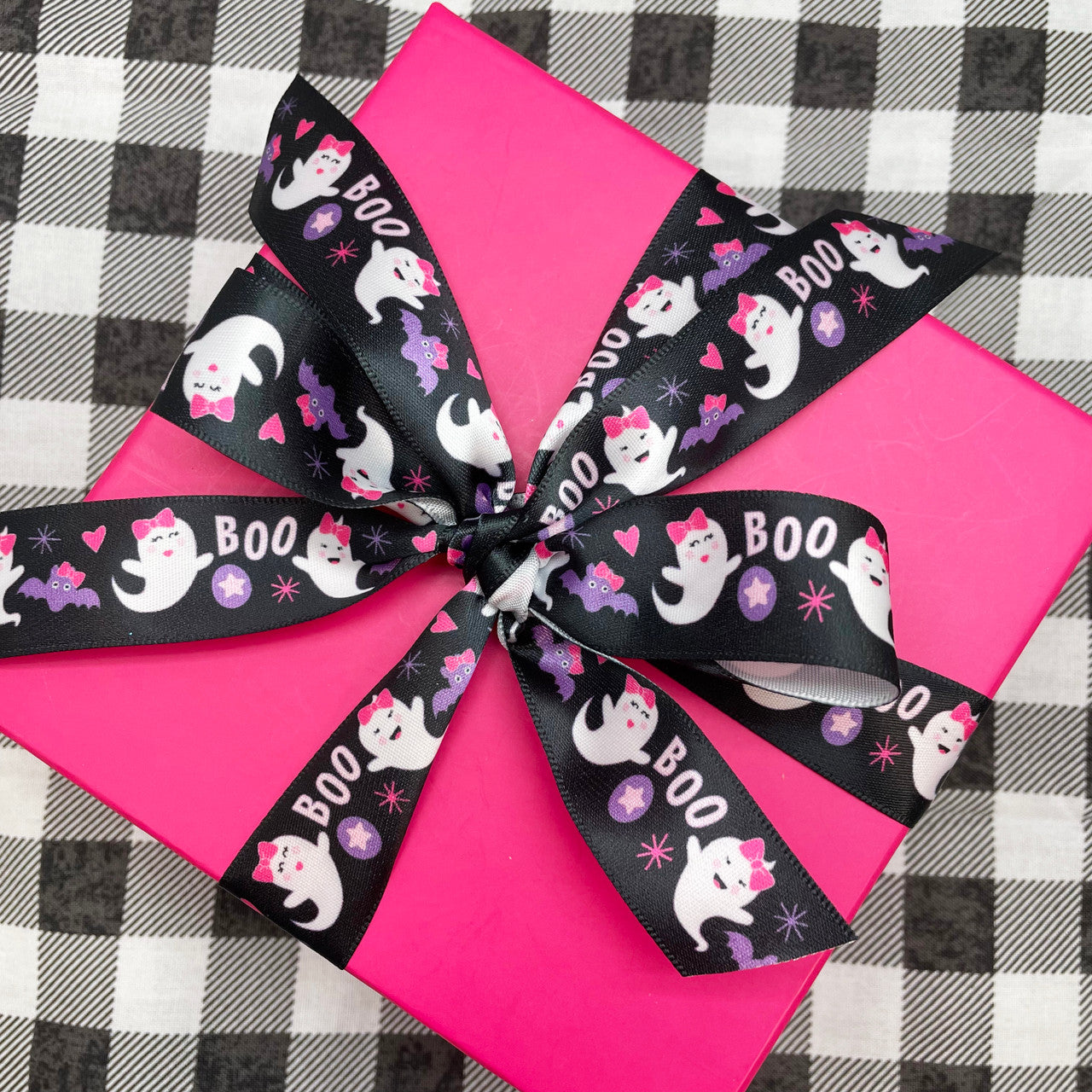 Little girl ghosts tie a pretty bow on a pink Halloween package! Perfect for any little girl goblin!