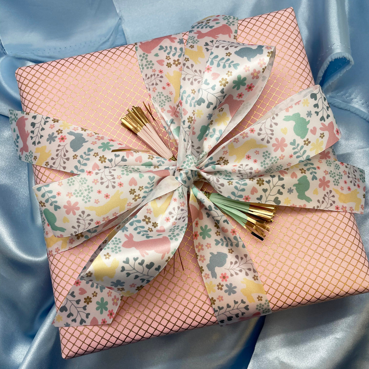 An elegant easter gift tied with our beautiful pastel bunnies. Any Easter brunch hostess would love this special gift!