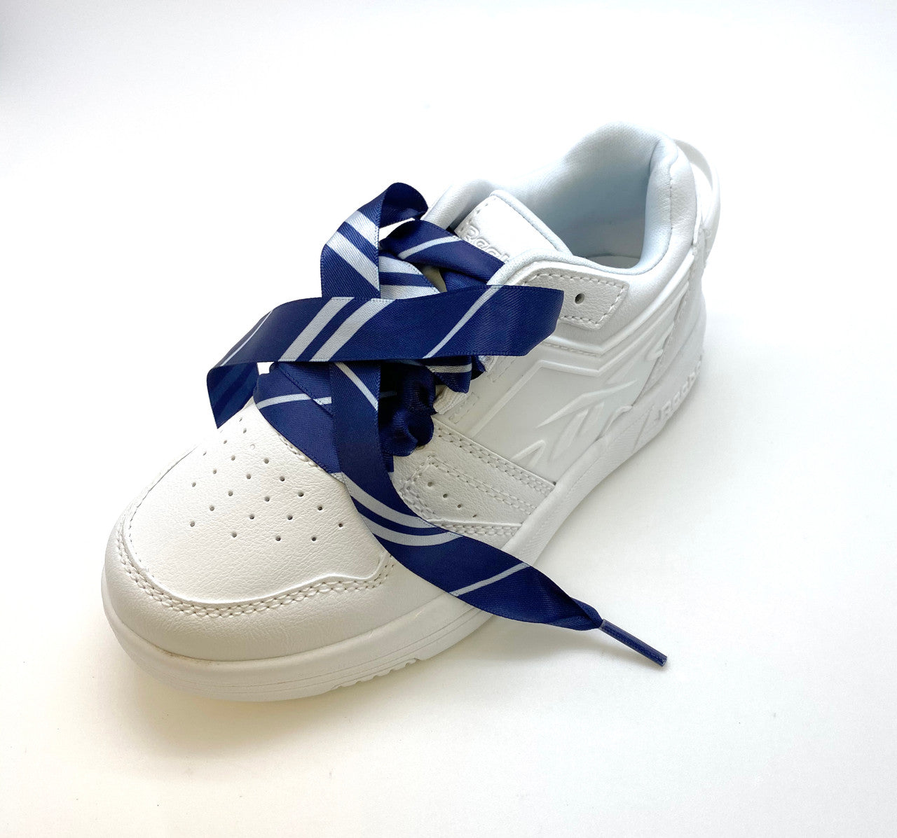 Fun fashion shoelaces will make you want to dance through your day! Lace your shoes with  our fun navy blue and silver stripe design