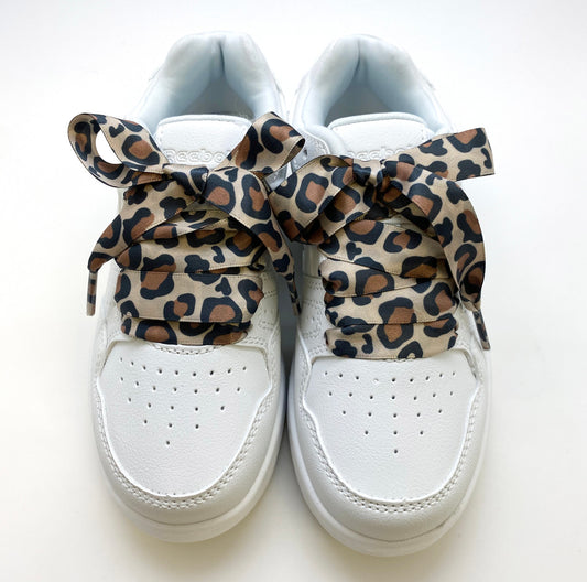 Satin shoelaces leopard print design is perfect for adding some fun and fashion to your sneakers! This is a great shoelace for fun dance shoes, wedding shoes, cheerleading and recitals! All our ribbon shoelaces are printed using dye sublimation technology and can be washed, ironed and re-used! All our laces are designed and printed in the USA