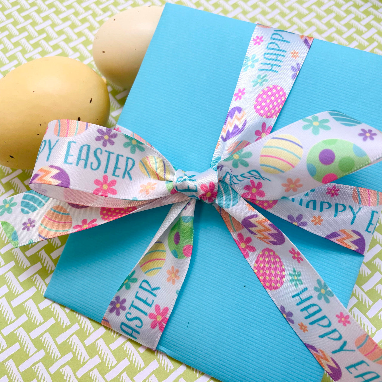 Our sweet 7/8" wide Happy Easter ribbon  makes the perfect how for all your Easter gifts, baskets and boxes!