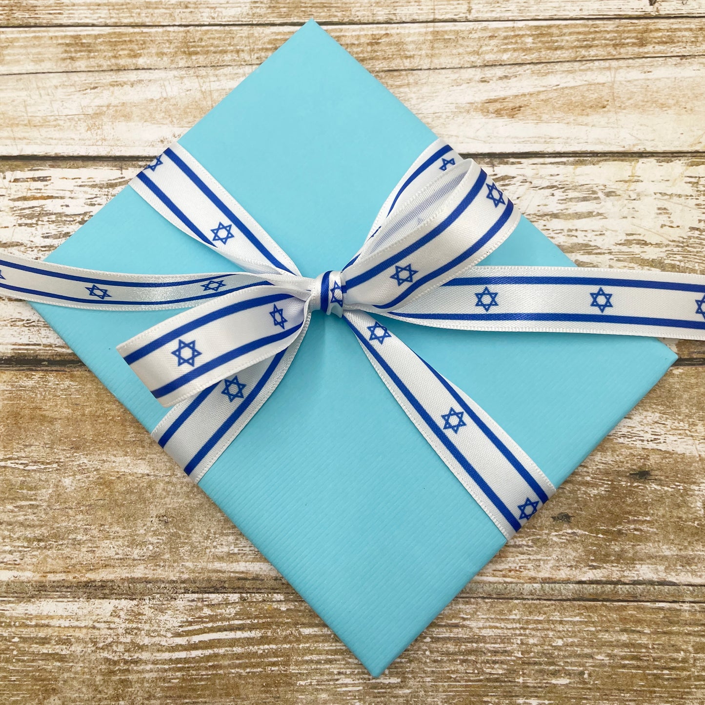 Israeli Flag ribbon royal blue stripe at top an bottom with the Star of David , printed on 5/8" and 7/8" white satin and 7/8"grosgrain
