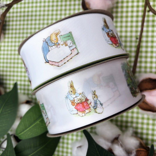 Bunny ribbon, rabbits in a blue jacket of storybook fame printed on 1.5" white satin and grosgrain
