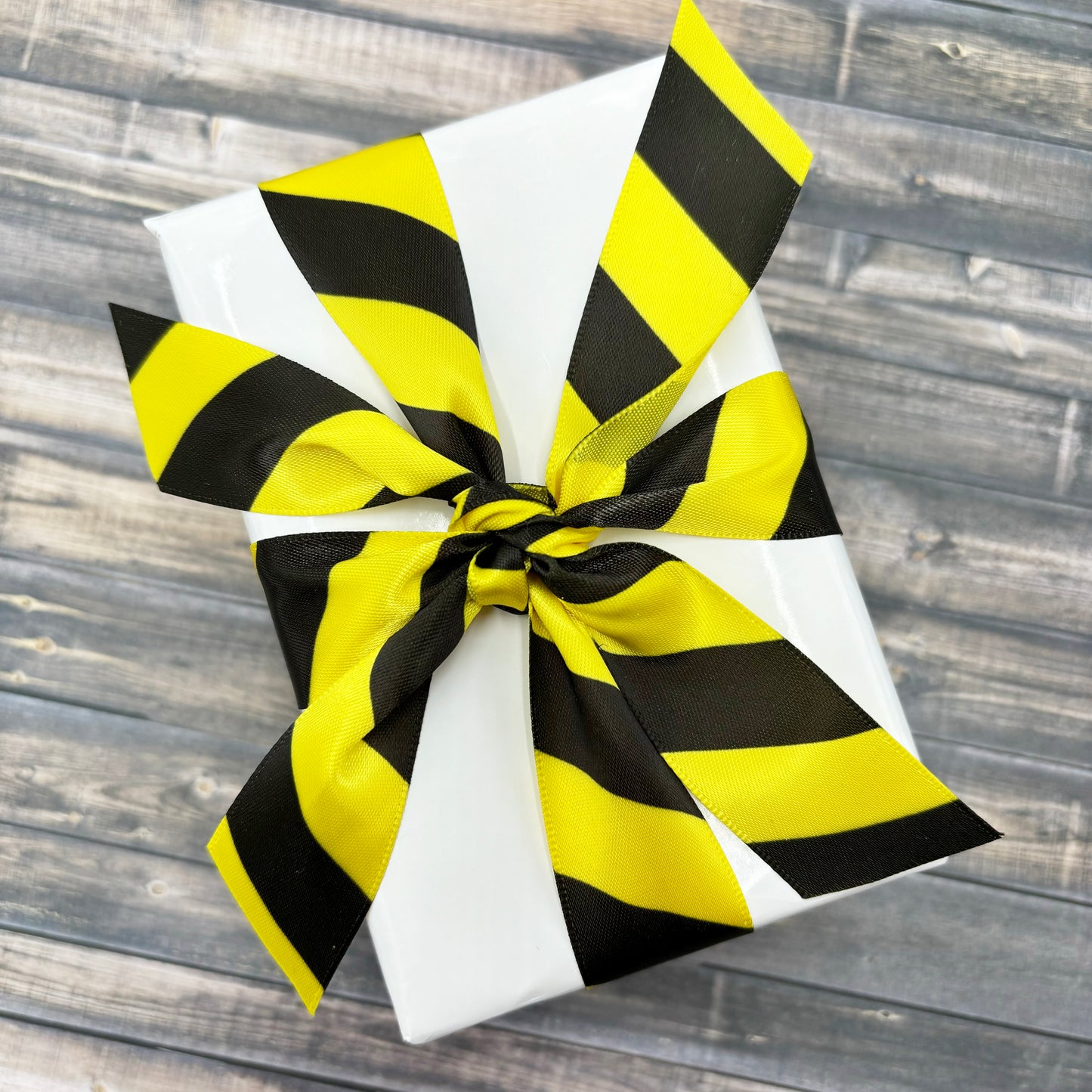 Caution Tape ribbon diagonal black stripes printed on 5/8" 7/8" and 1.5" bright yellow single face satin