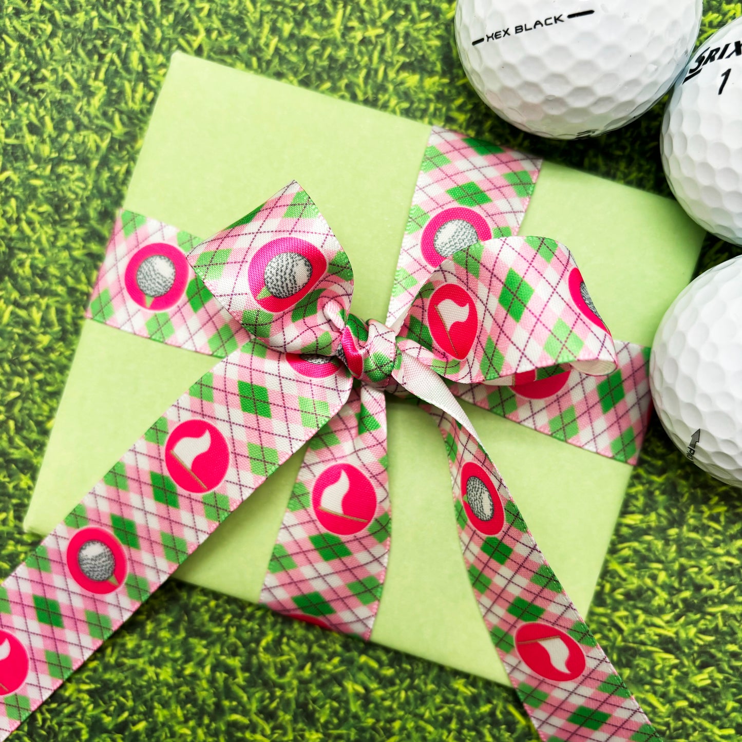 Golf ribbon golf balls and tees and golf flags in an argyle background in pink or blue printed on 7/8" white satin