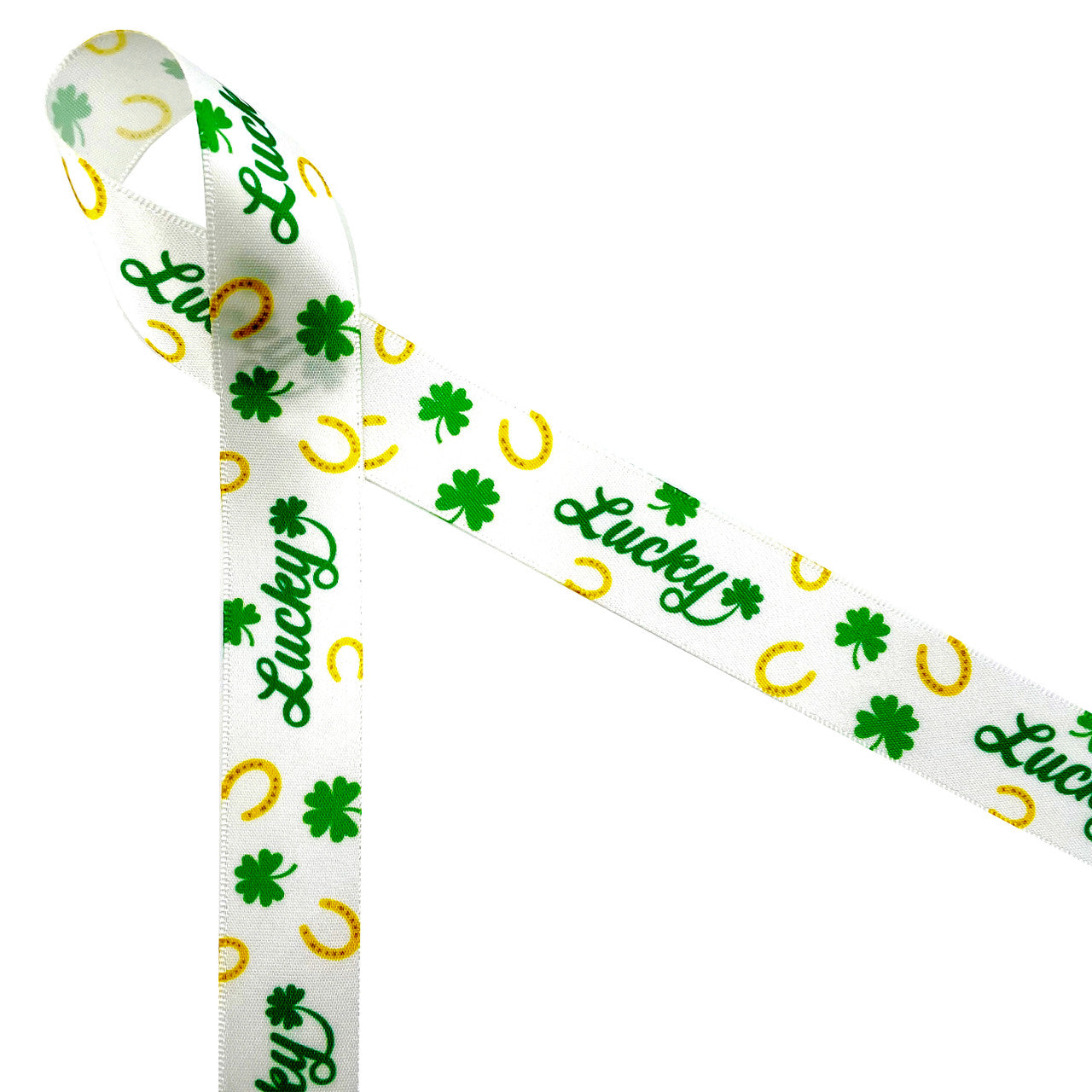Our Lucky ribbon is perfect for St Patrick's Day and Equestrian events. Lucky in Kelly green with shamrocks and gold horse shoes in  the background printed on 7/8" white single face satin ribbon is a fun ribbon for gift wrap, gift baskets, party favors, party decor, bows, hair bows and hat bands. This is ideal for ribbon crafts of wreath making, sewing, scrap booking and quilting projects too. All our ribbon is designed and printed in the USA