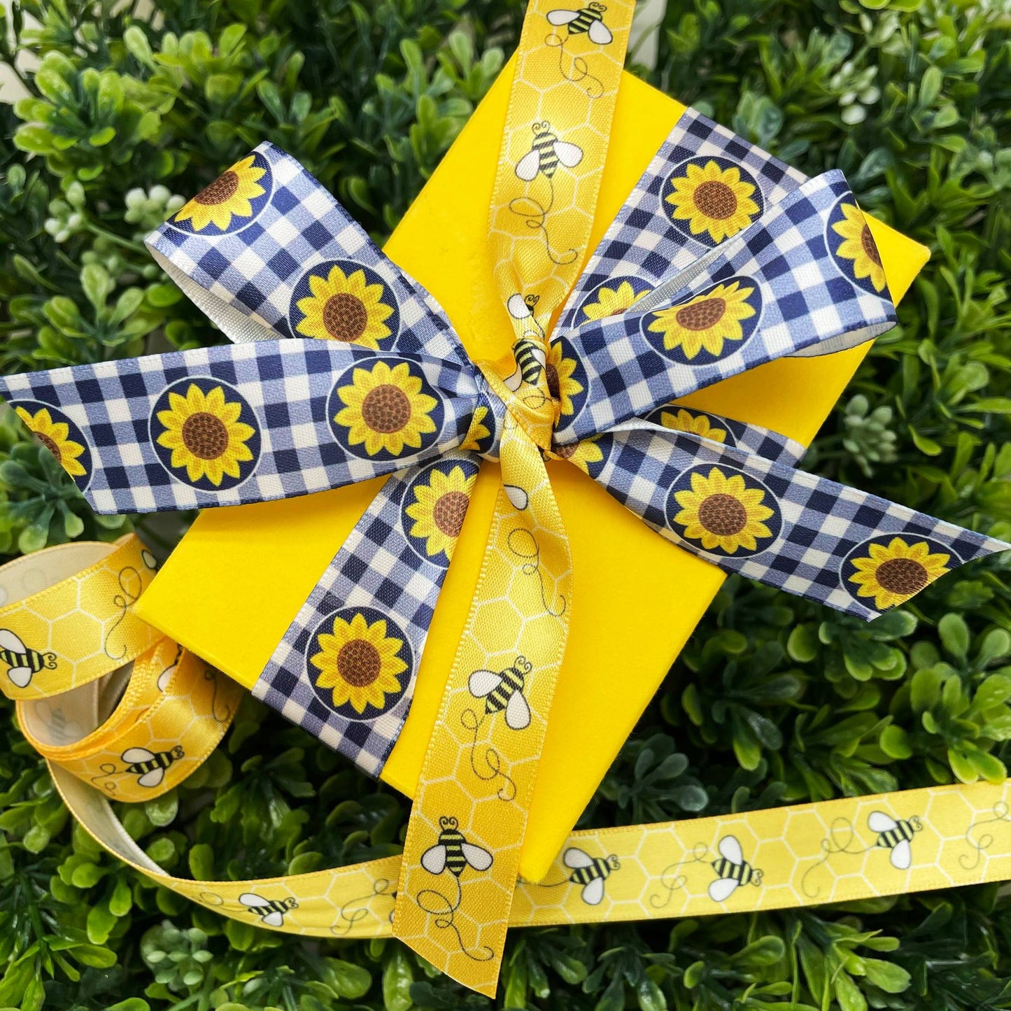 Buzzing Bees Ribbon with a yellow comb background on 5/8" White Single Face Satin