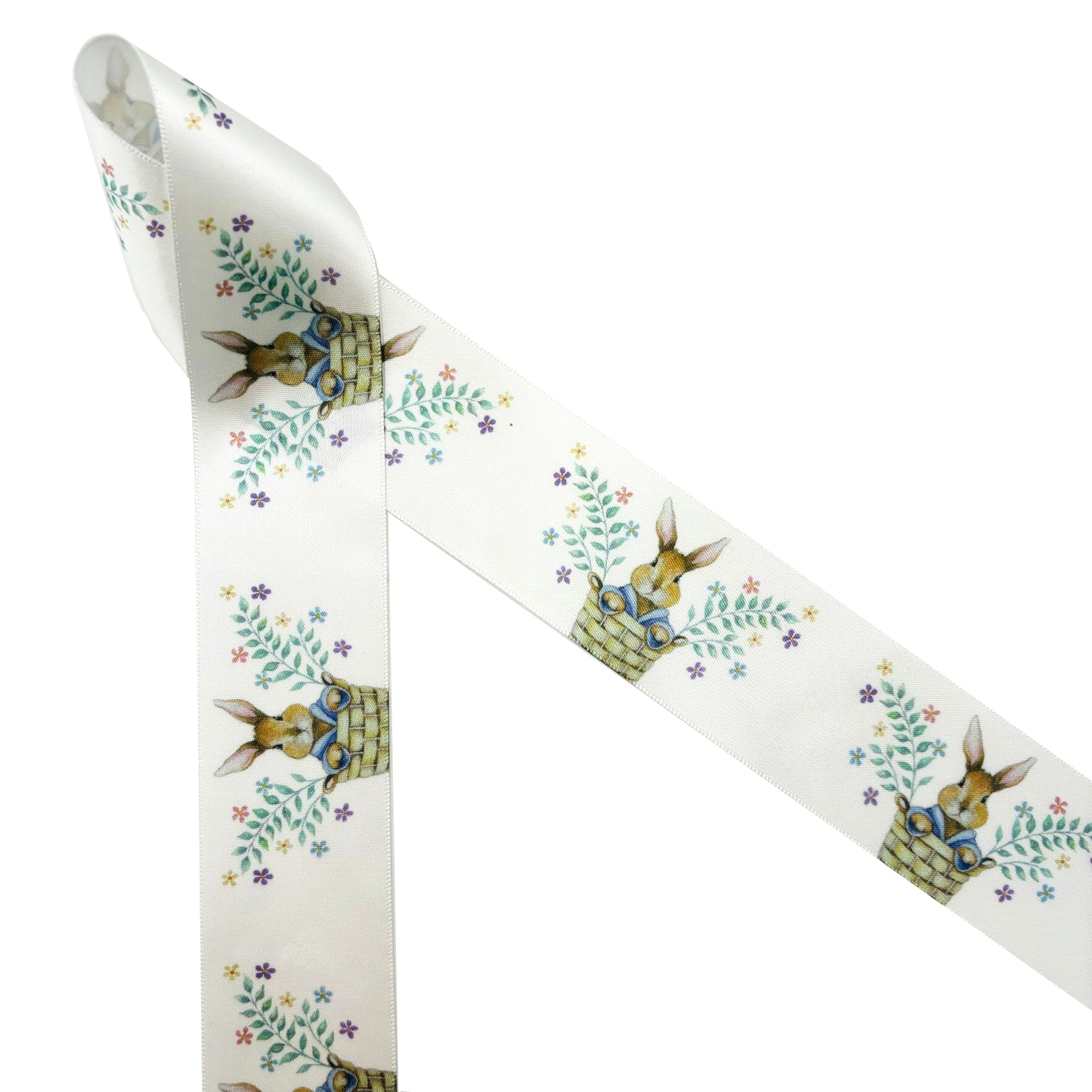 Bunny ribbon Easter bunny pops out of a basket with sprigs of Spring flowers printed on 1.5" white satin and grosgrain