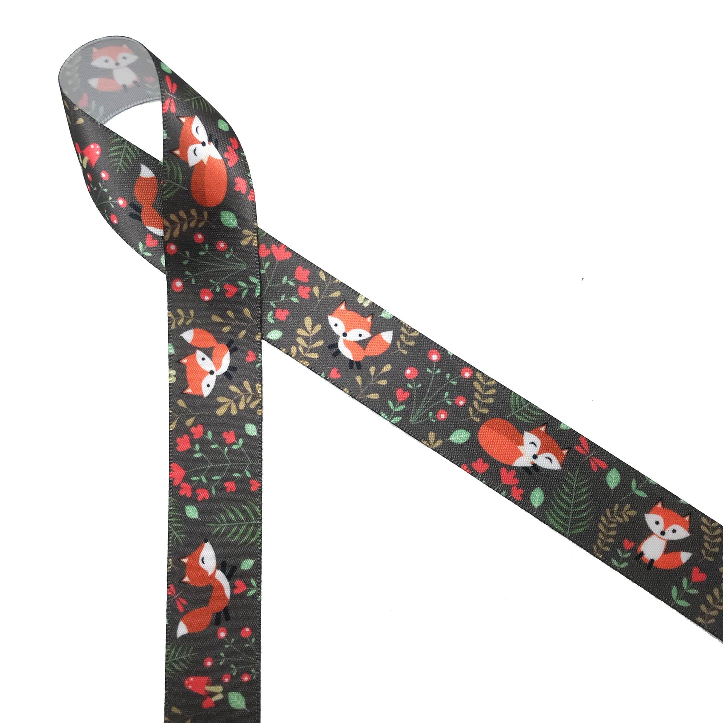 Woodland Fox ribbon with red flowers and fern on a dark green background printed on  7/8" and 1.5" white single face satin ribbon