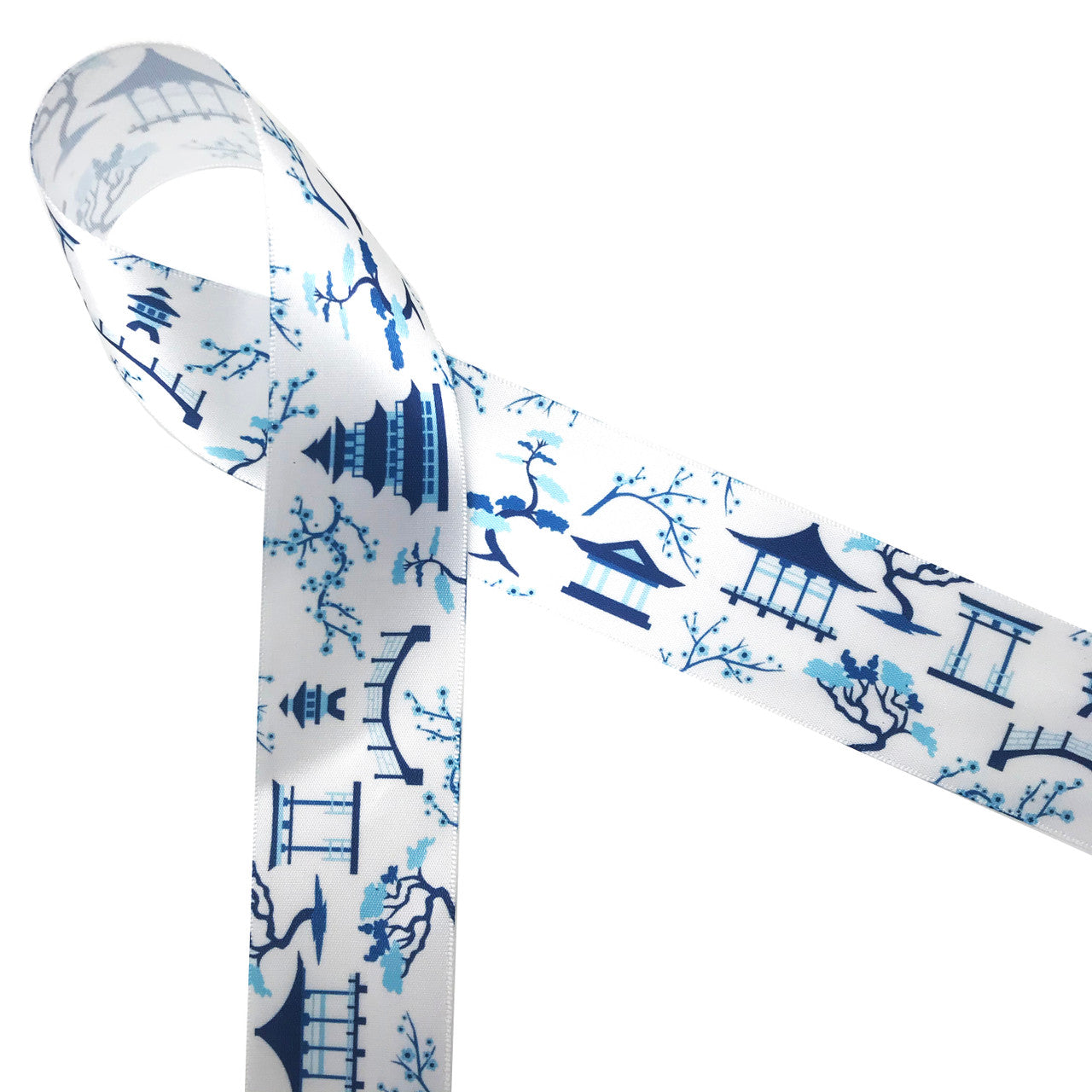 Japanese gardens have been inspiration for designs for centuries! Japanese garden Chinoiserie blue and white ribbon printed on 1.5" white single face satin ribbon is ideal for gift wrap, quilting, floral design, interior design and crafts! This is the perfect ribbon for anyone loving blue and white designs! All our ribbon is designed and printed in the USAOur