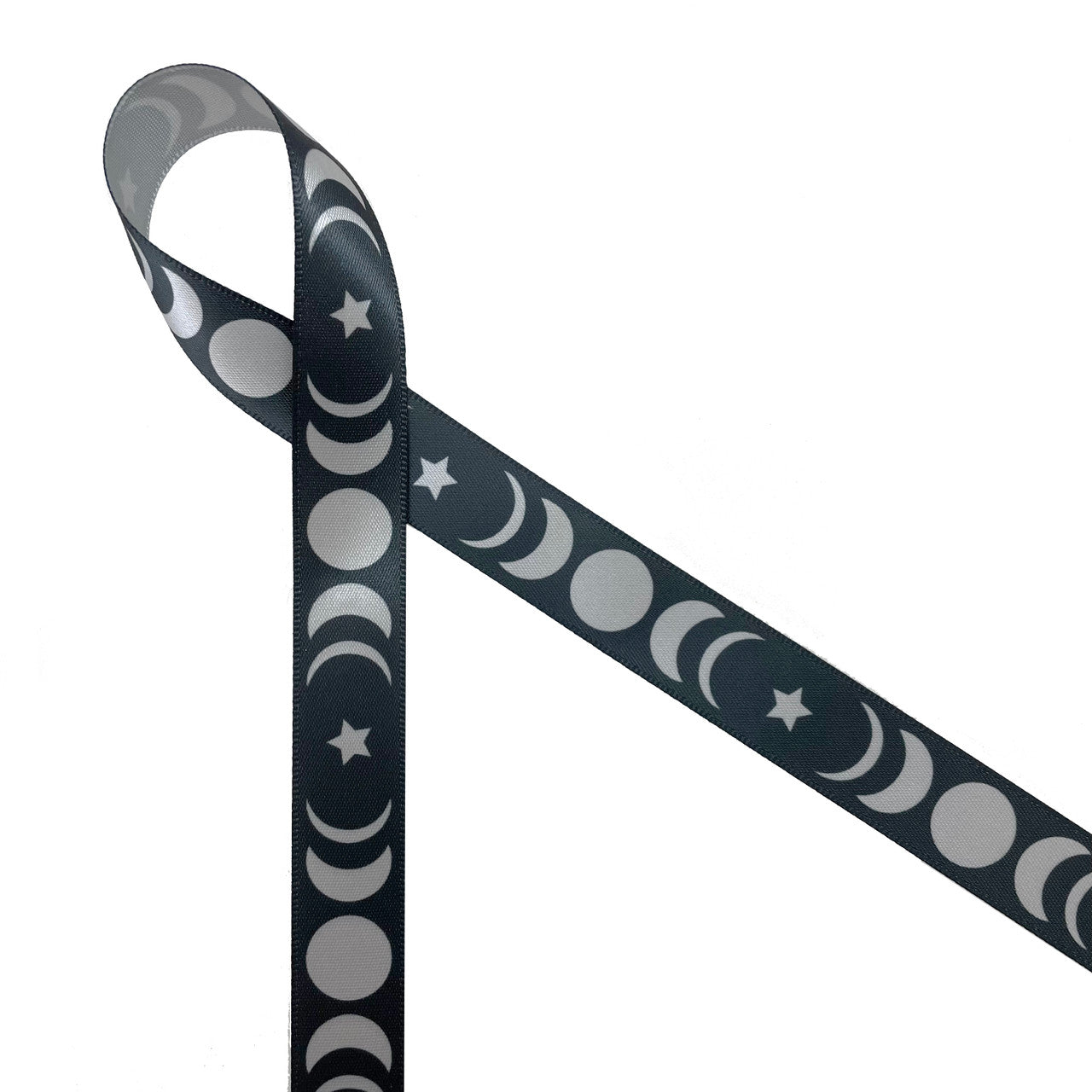 Moon ribbon featuring moon phases in silver on a black background printed  on 5/8 silver satin, 10 yards