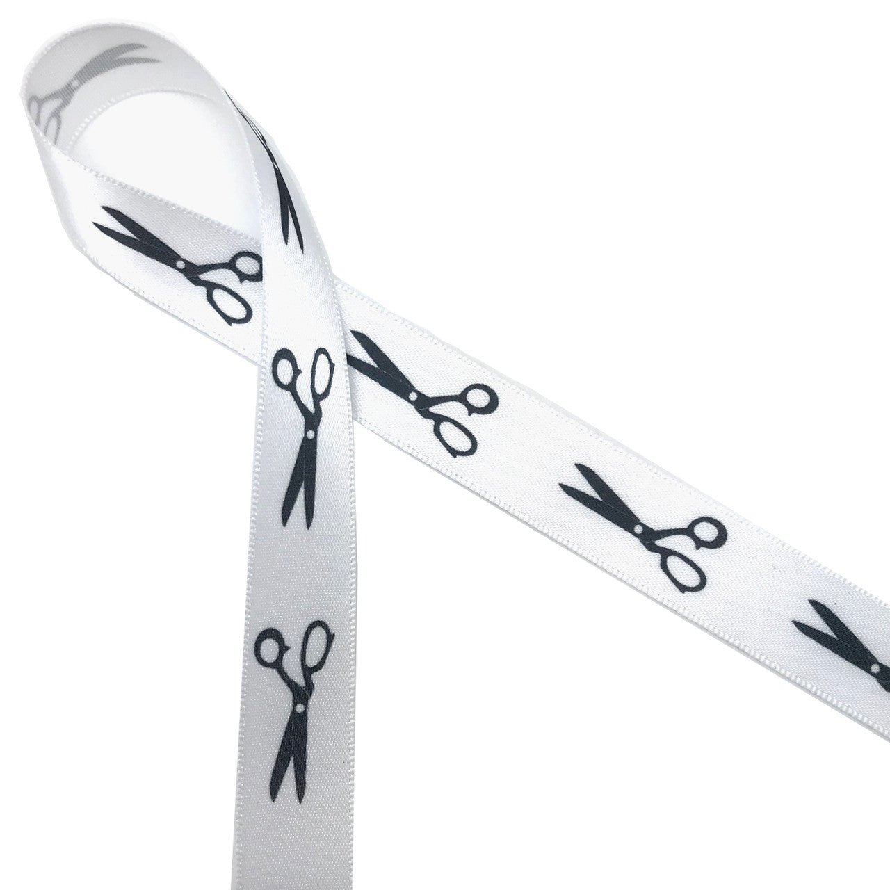 Scissors in black silhouette printed on 5/8" white single face satin ribbon is an ideal way to tie gifts and favors for your hair stylists or sewing skilled friends!