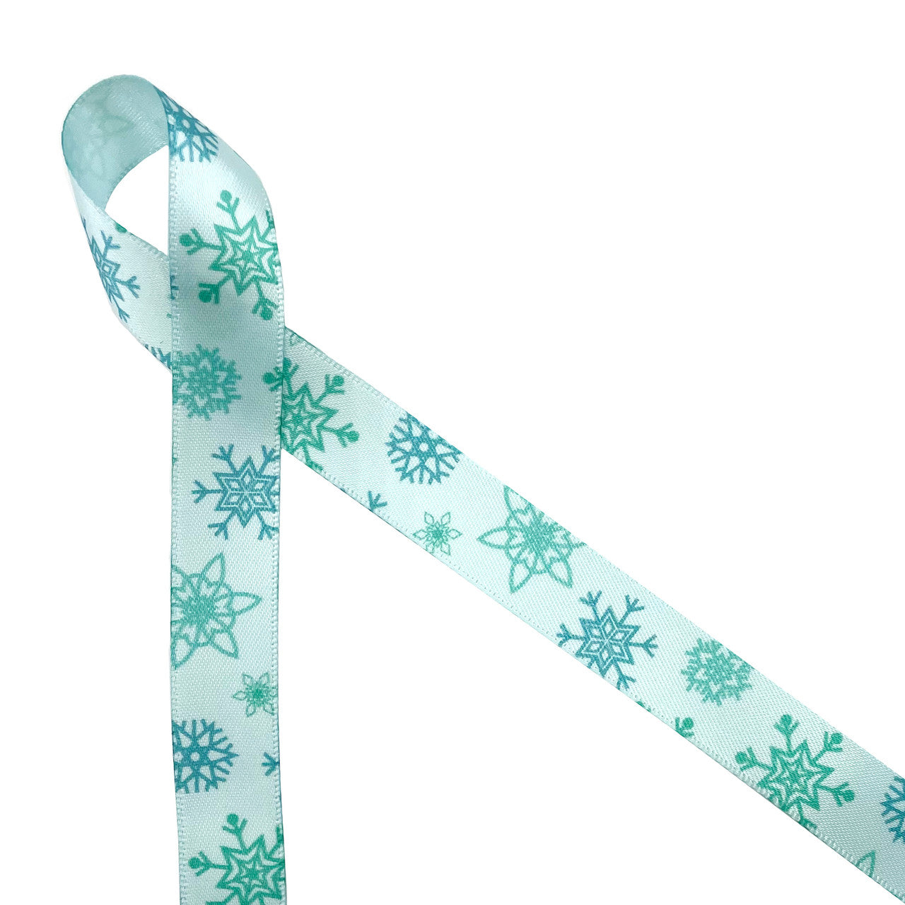 Snowflakes in medium blue on ice blue 5/8 single face satin ribbon