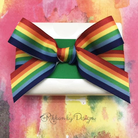Rainbow Stripes Ribbon Stripes of red, orange, yellow, green, blue and purple horizontally positioned on 7/8" white grosgrain