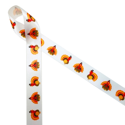 Thanksgiving Turkey ribbon with adorable little turkeys with orange tail feathers, brown body and of course a Pilgrim hat marches along 7/8" white single face satin making for the cutest Thanksgiving treats ever! This fun ribbon is ideal for table decor, gift wrap, gift baskets, cookies, cake pops, candy treats and more! Be sure to have this ribbon on hand for all your Thanksgiving crafts too! All our ribbon is designed and printed in the USA