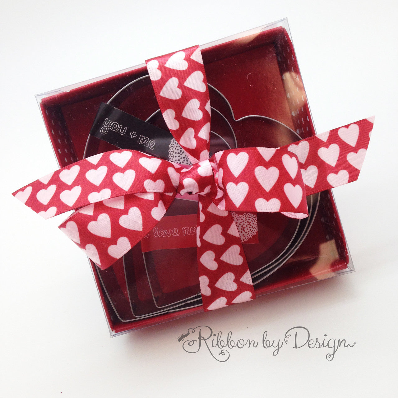 Valentine Hearts Ribbon pink heart design on a red background prionted on 7/8" Lt. Pink Satin Ribbon