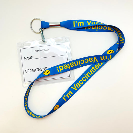 Vaccine lanyard I'm Vaccinated in yellow on a blue background printed on 3/4" wide lanyard webbing, 24" long