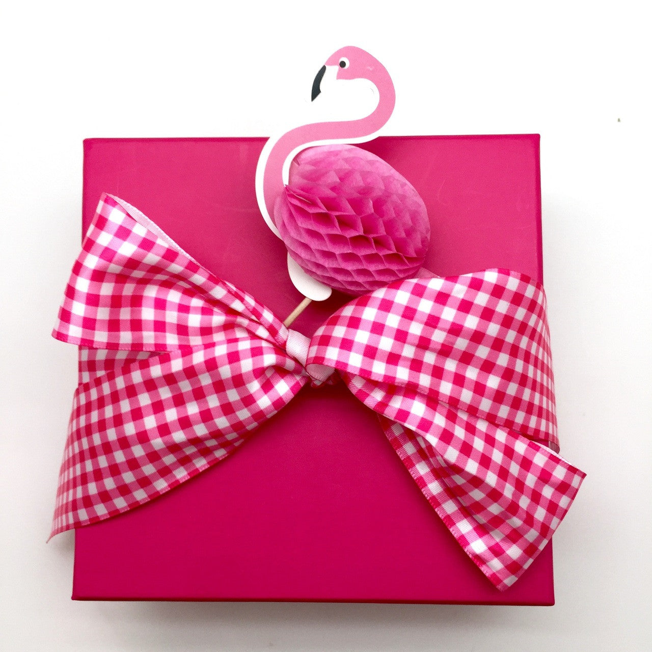 Our 1.5"  pink gingham ribbon ties a handsome bow!  Adding a little country flair to a flamingo party is lots of fun!