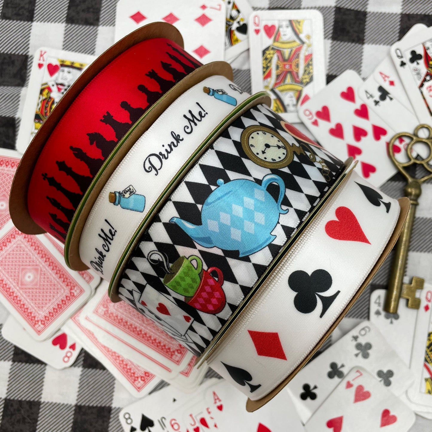 Alice in Wonderland blue "Drink Me" bottle ribbon with black text printed on 5/8" white single face satin