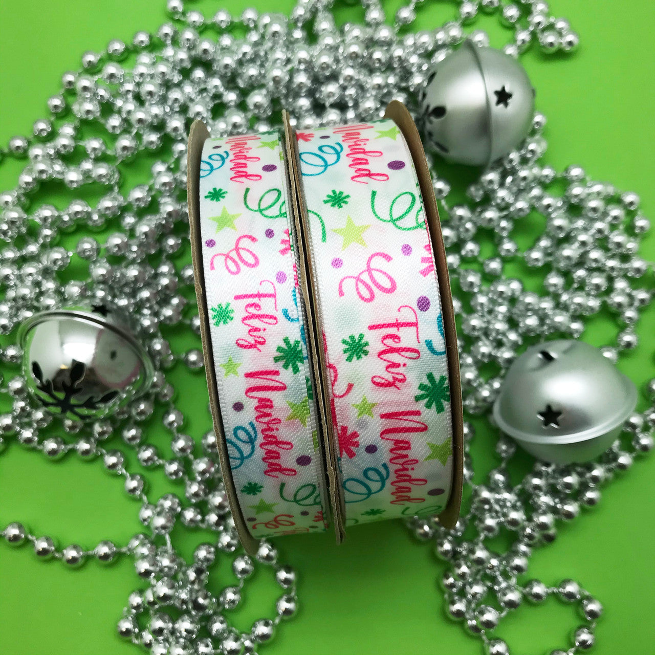 Our Feliz Navidad ribbon comes in 5/8" and 7.8" widths for all your decorating needs!