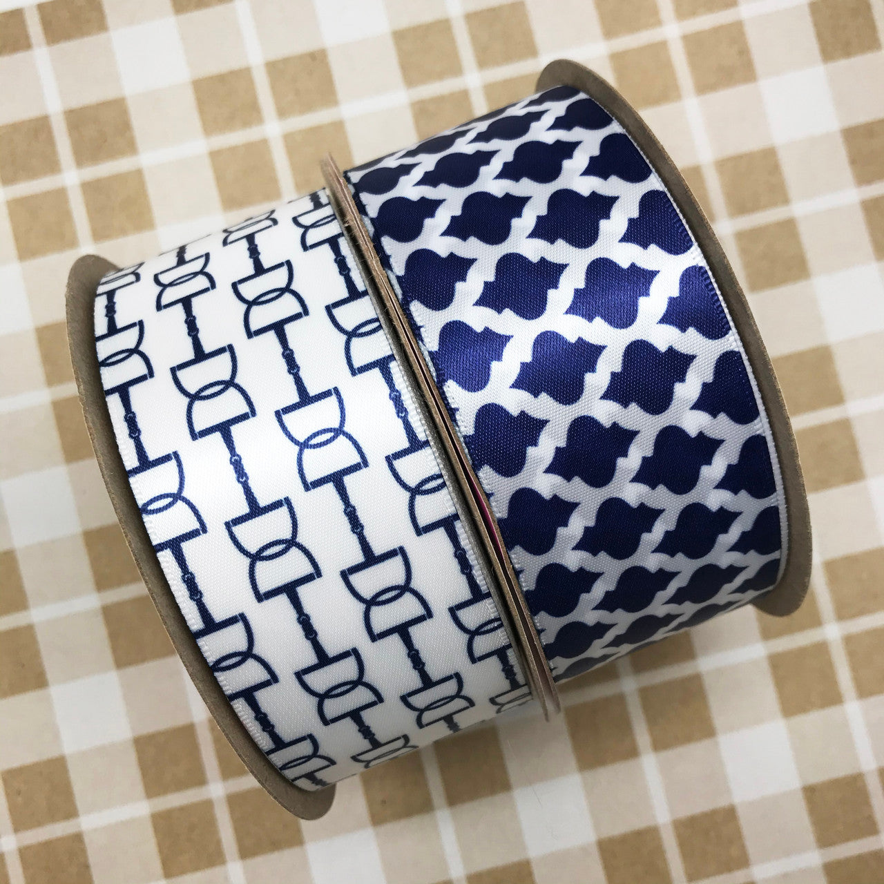Our navy blue Quatrefoil ribbon pairs beautifully with our snaffle bit ribbons for the Equestrian lovers out there!