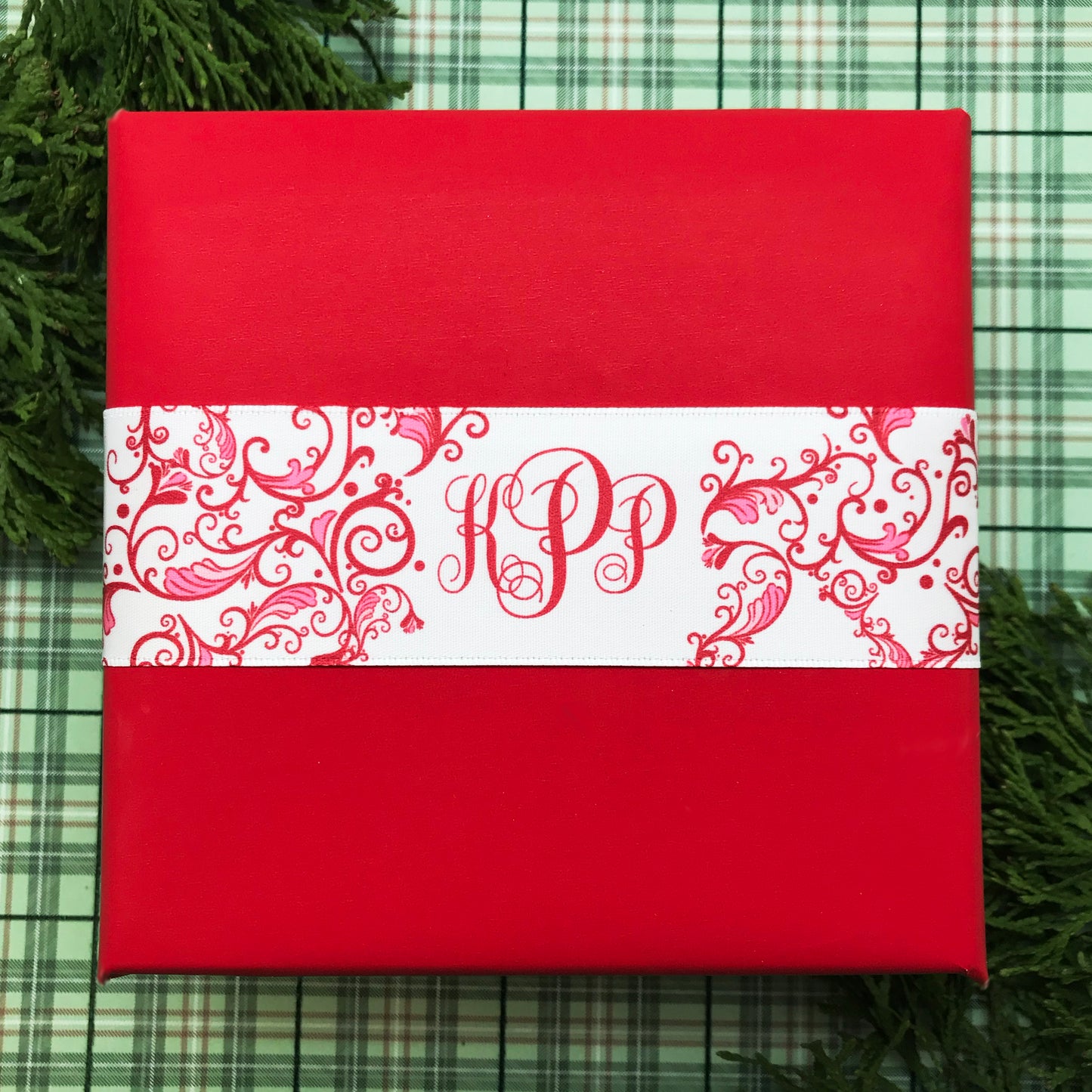 Personalized Monogram holiday ribbon in red with a red Chinoiserie design printed on 1.5"  white single face satin, 25 yards