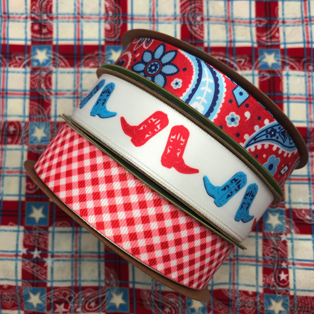 There are so many ways to mix and match our Patriotic Paisley with other ribbons! We've paired it with cowboy boots and red and white gingham for a fun country western theme!