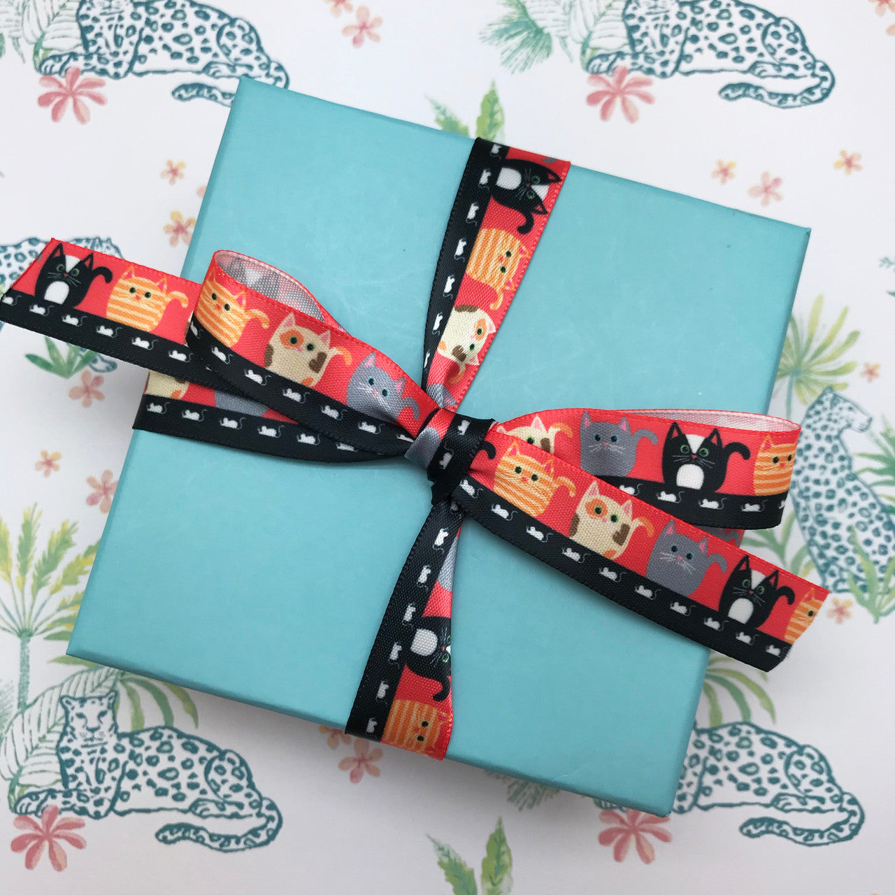 Tie a pretty package with our cat themed ribbon for the cat lovers in your life!