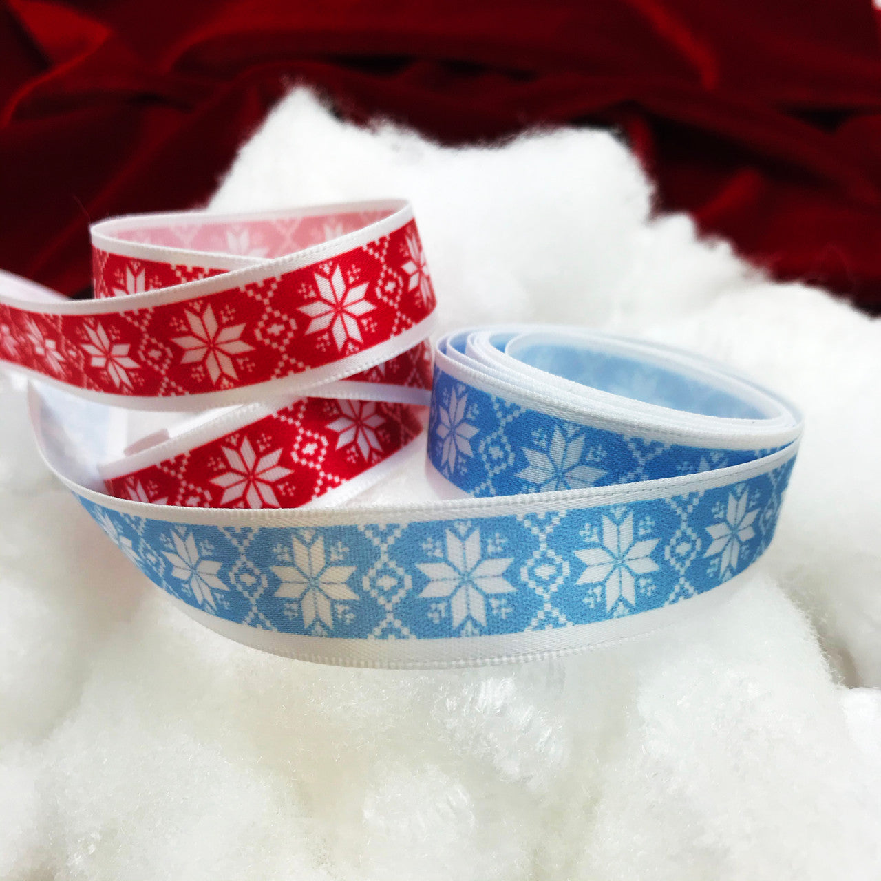 Our Nordic design snowflake ribbons are available on red and ice blue backgrounds printed on 5/8" white single face satin ribbon.