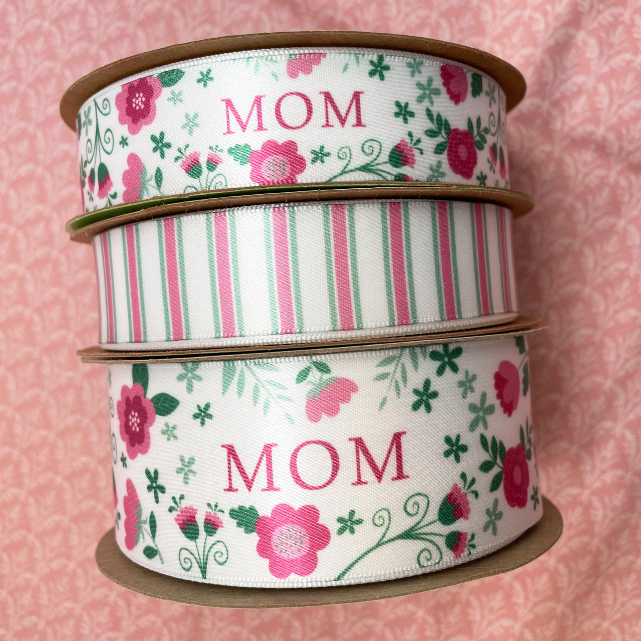 Our Mom floral ribbon comes in two sizes and matches so well with our pink and sage stripes! Make a truly elegant affair with these beautiful ribbons!