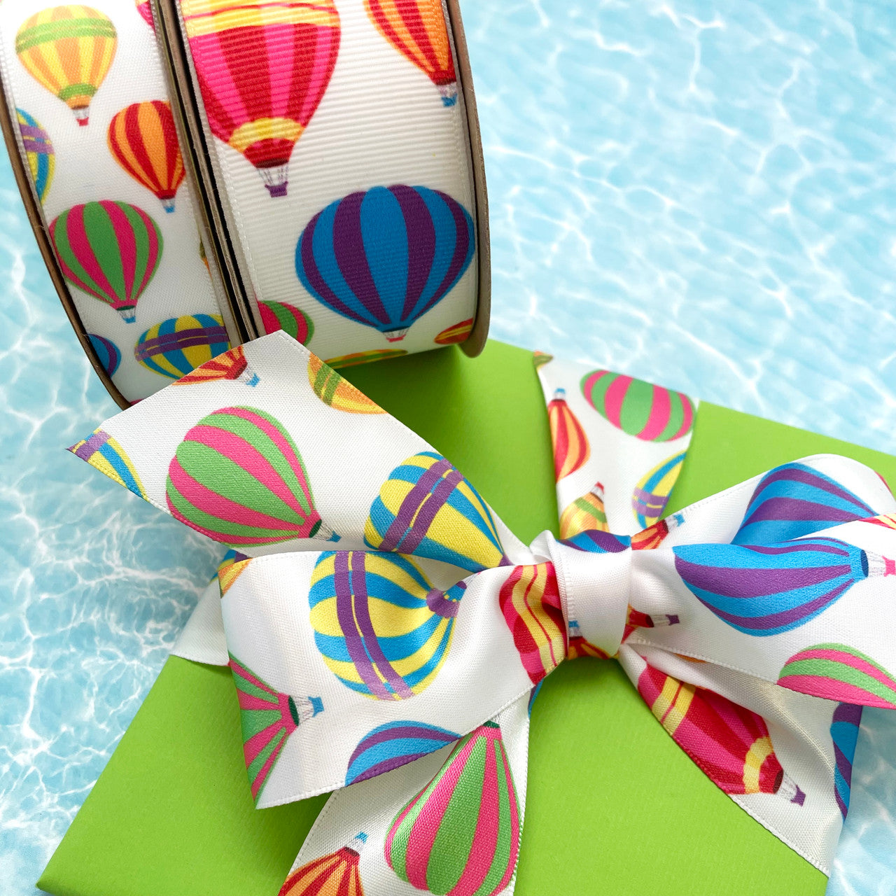 Our Hot Air Balloon ribbon comes in two sizes and fabrics! There's an option for every need!