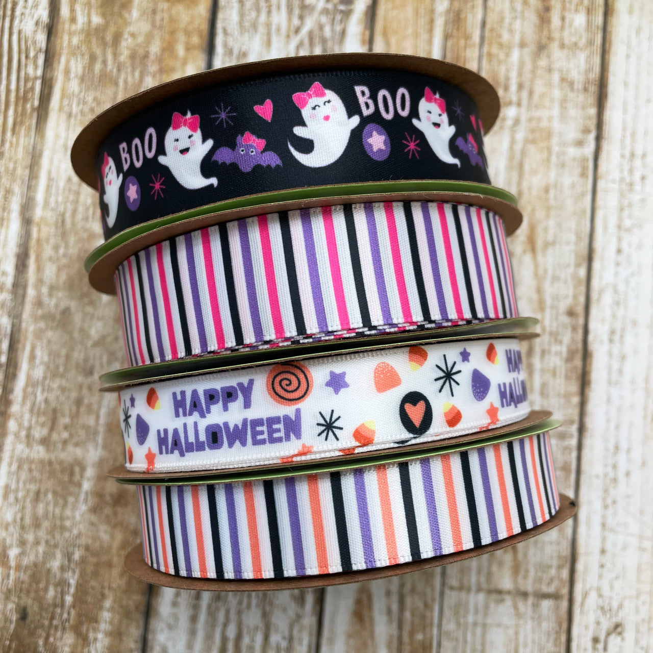 Mix and match our pastel Halloween ribbons with our girl ghosts and pink, black and white stripes for a unique Halloween holiday look!