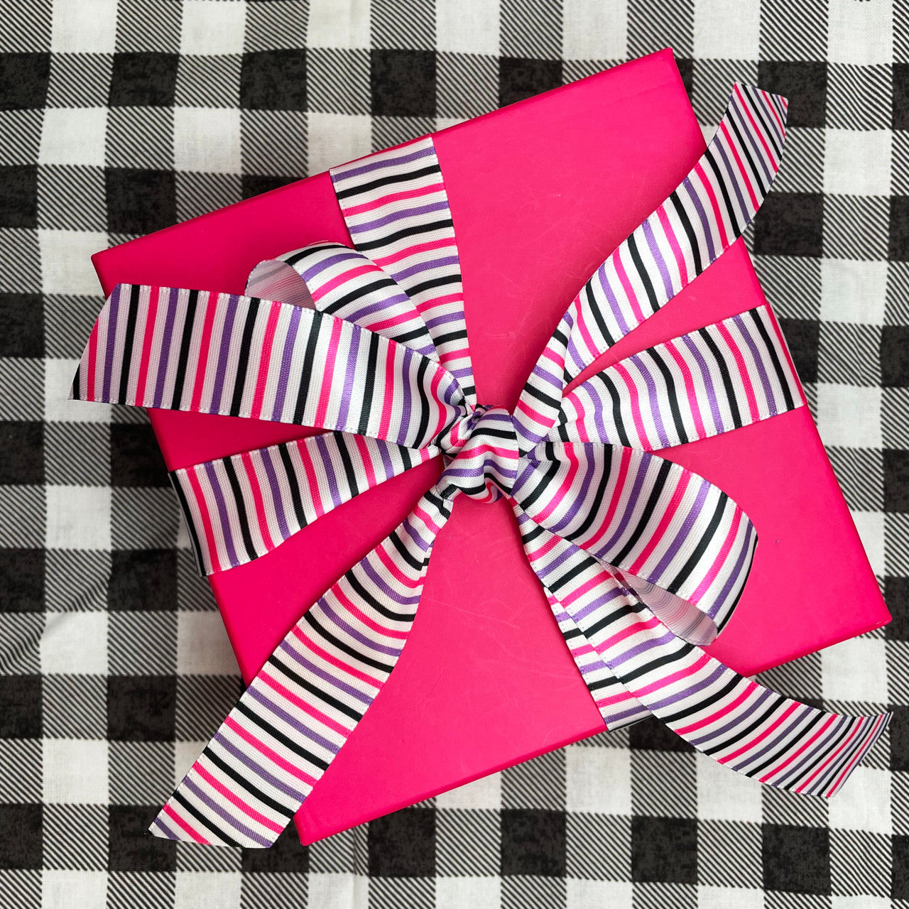 Our pink, lavender and black stripes make a beautiful bow for a Halloween gift or gift wrap at any other time of year!