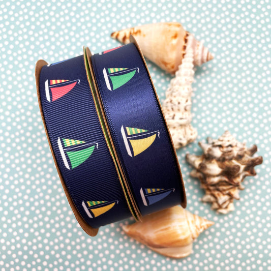Sailboat ribbon Sailboats with green, yellow, blue and red sails on a navy background printed on 7/8" white satin and grosgrain