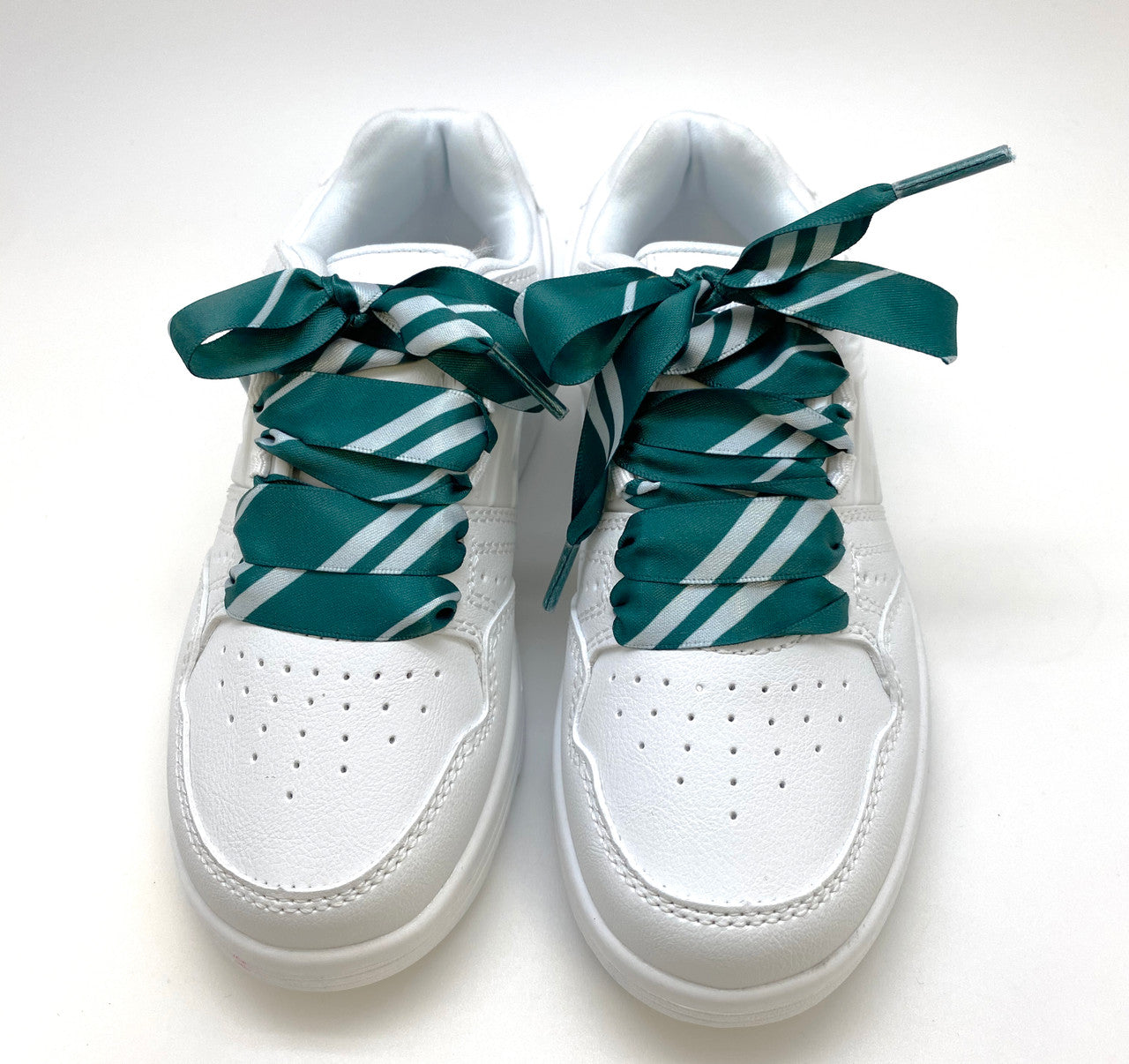 Satin shoelaces tie Hogwarts Slytherin design is perfect for adding some fun and fashion to your sneakers! This is a great shoelace for fun dance shoes, wedding shoes, cheerleading and recitals! All our ribbon shoelaces are printed using dye sublimation technology and can be washed, ironed and re-used! All our laces are designed and printed in the USA