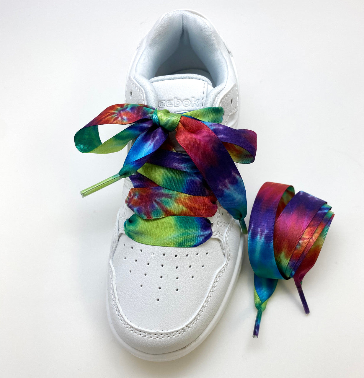 Lace your shoes with  our fun tie dye  print design!
