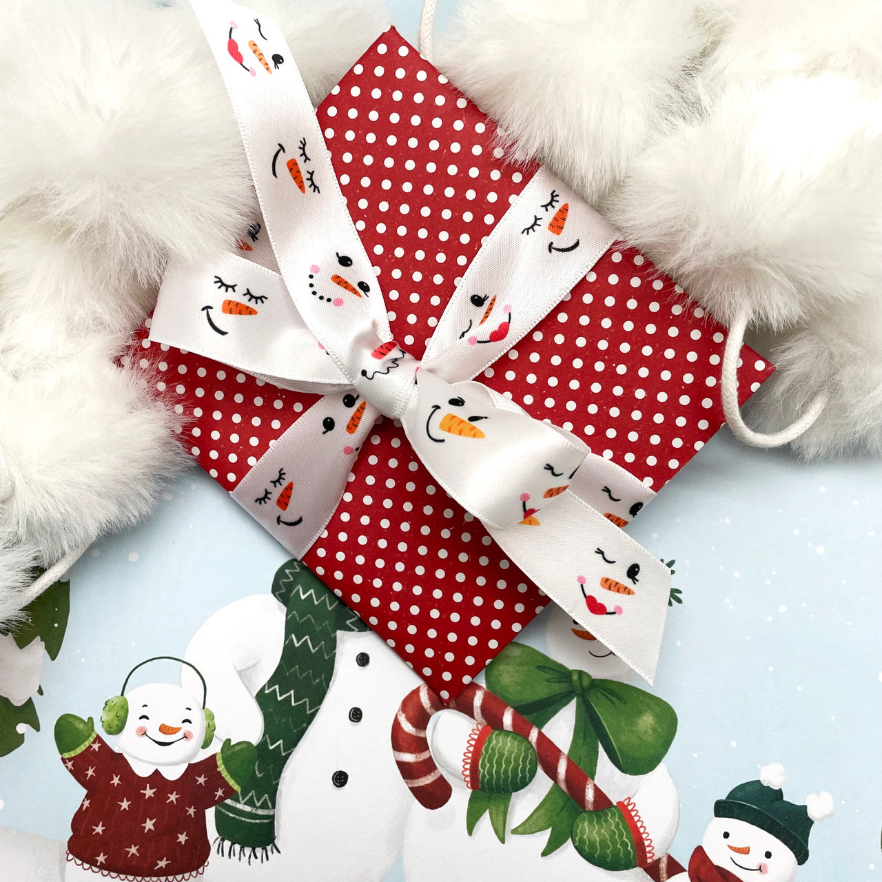 Our sweet snowman faces are adorable tied on a very special Christmas gift!