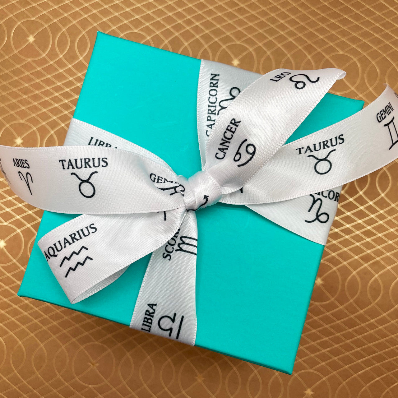 Tie a pretty bow on a gift for your astrology enthusiast!
