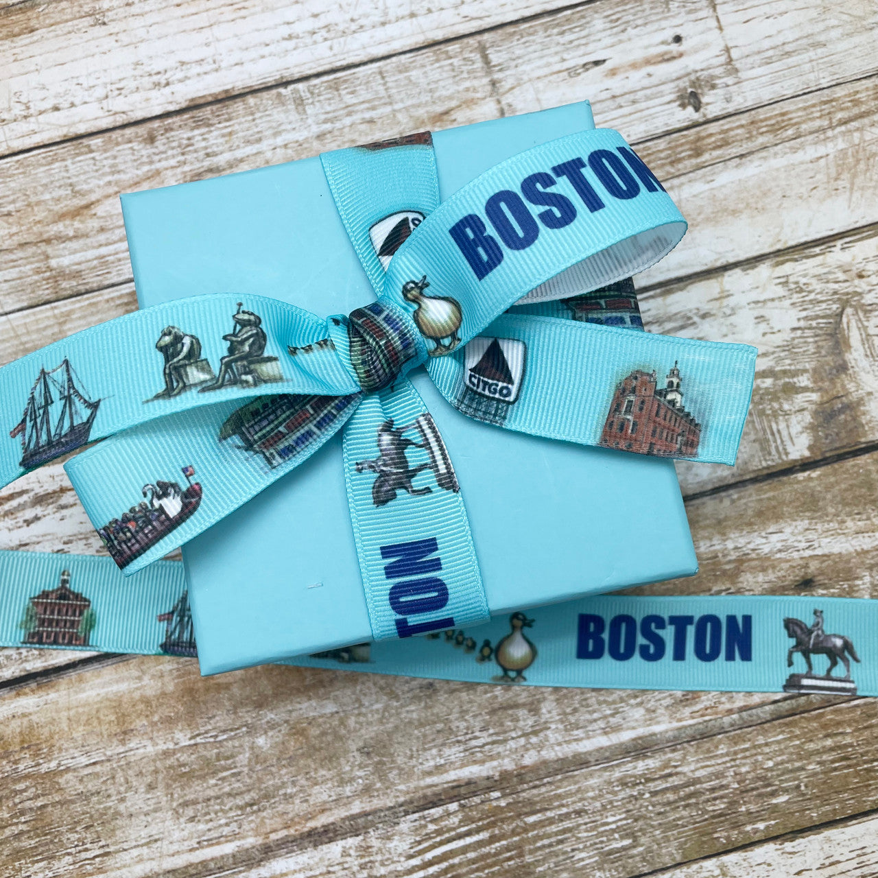 This pretty ribbon with a blue background featuring Boston land marks is perfect for a Boston themed gift!