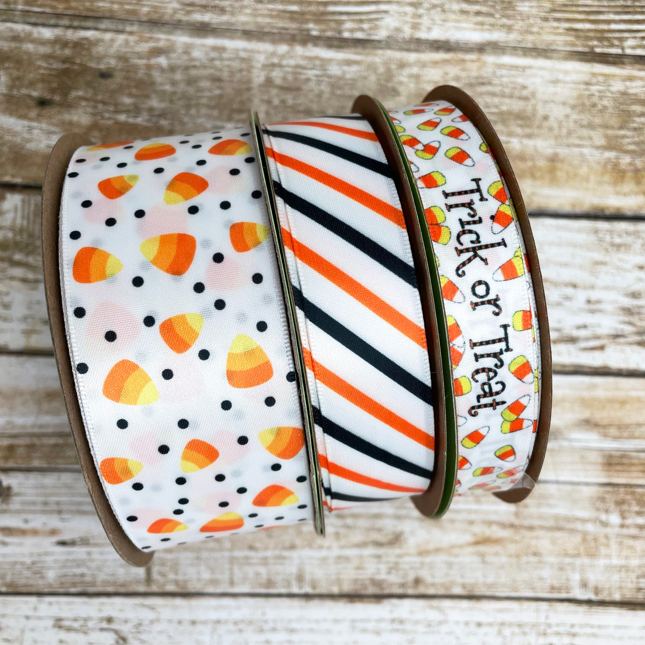 Mix and match our candy corn ribbon with Halloween stripes and Trick or Treat ribbon for a fun Halloween decor package!