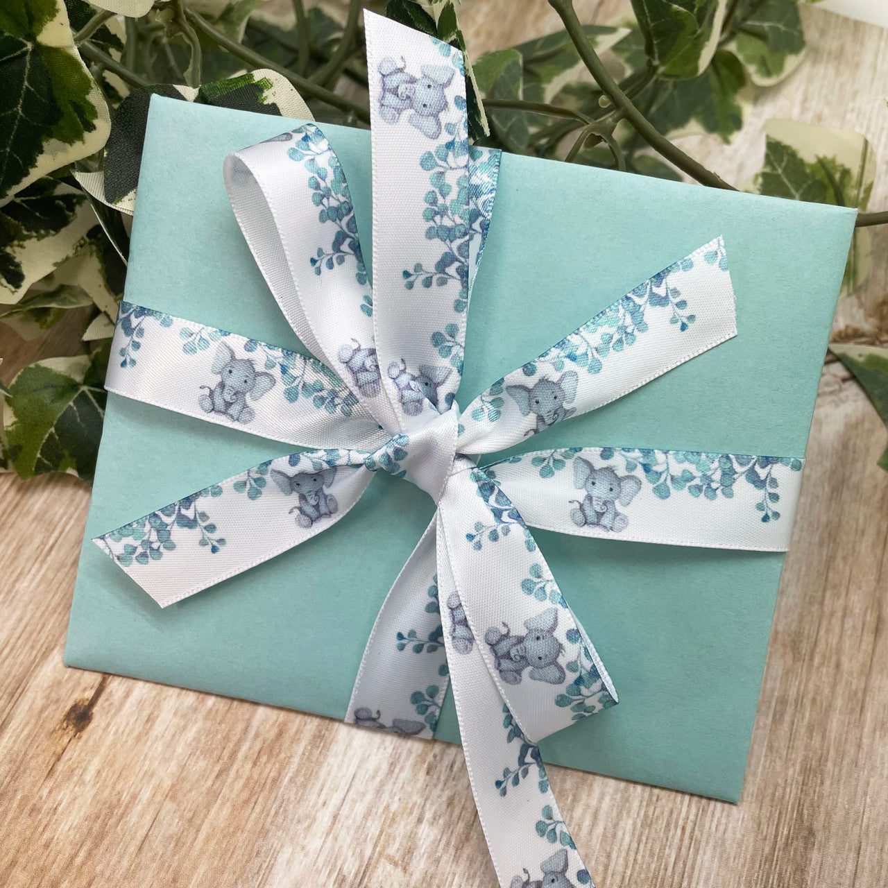 Tie a pretty bow on your baby shower gift card for the perfect presentation!