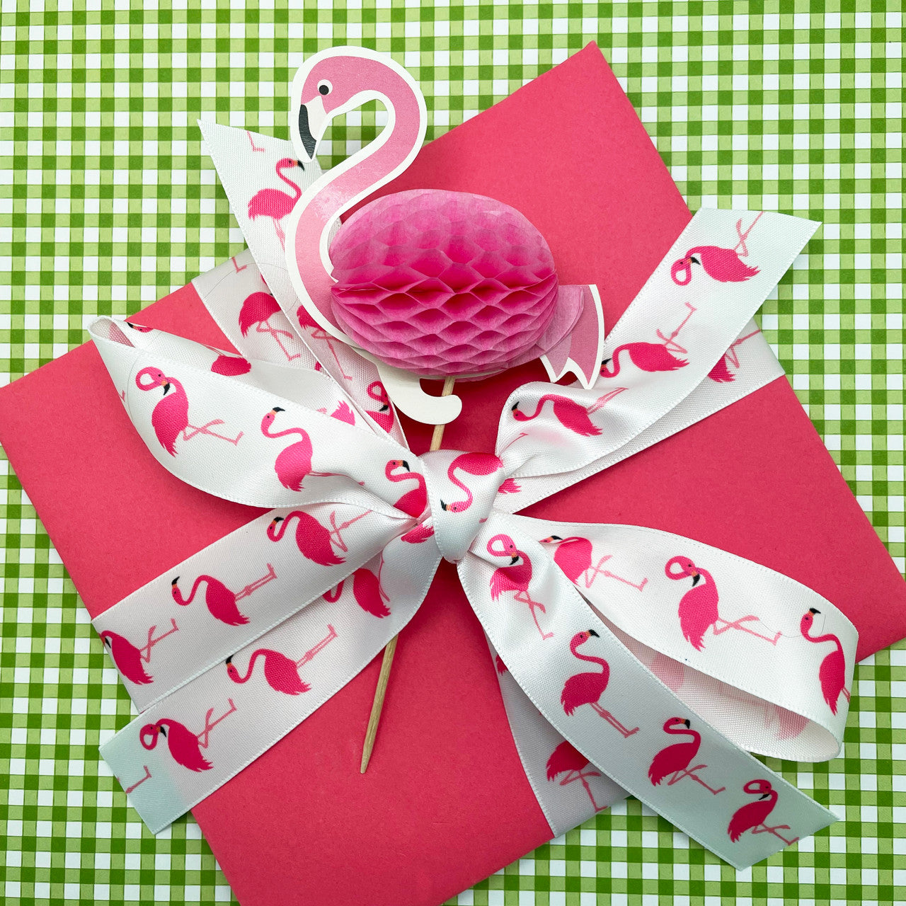 Pink flamingos tied on a pretty pink box are ready for gift wrap or party favors!