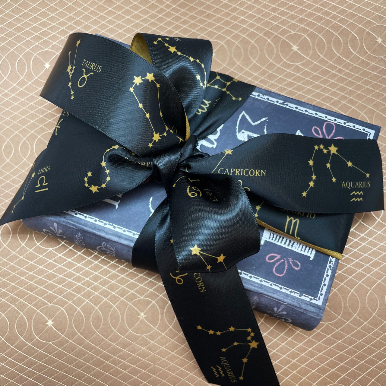 This luxurious ribbon ties a beautiful bow for gifts, wreaths and party decor for any astrology lover!