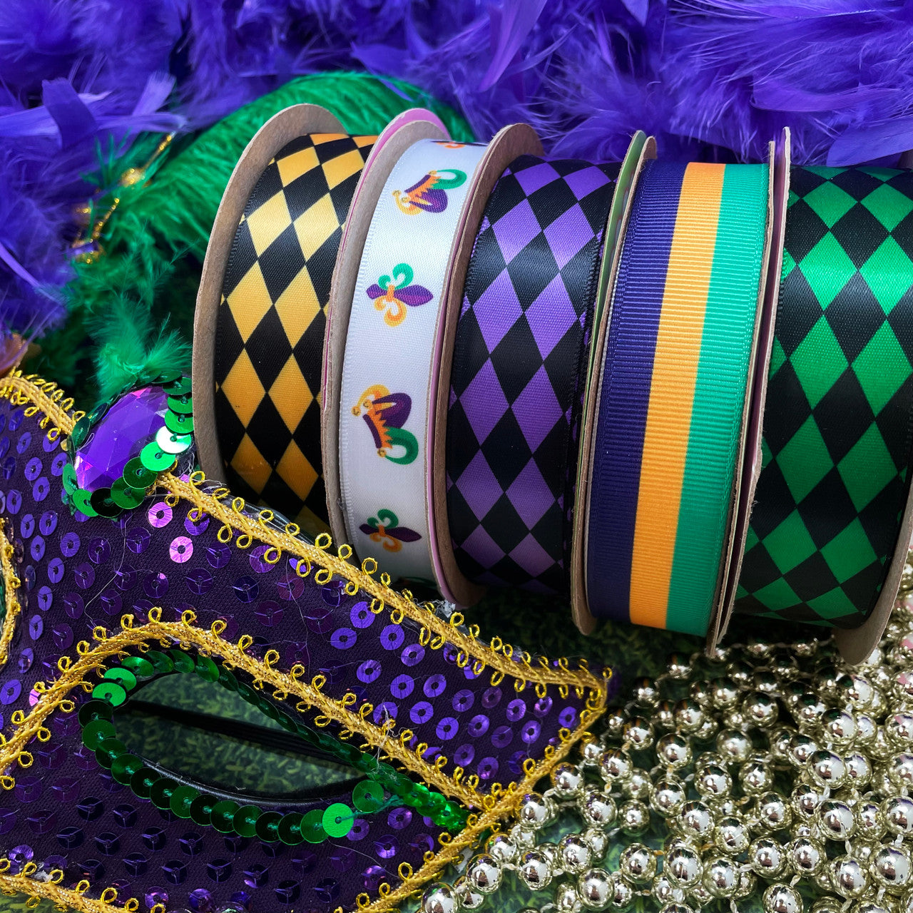 Mix and match our Mardi Gras  harlequin ribbons with the jester hats and stripes to create a beautiful Fat Tuesday themed craft project, wreath or quilt!
