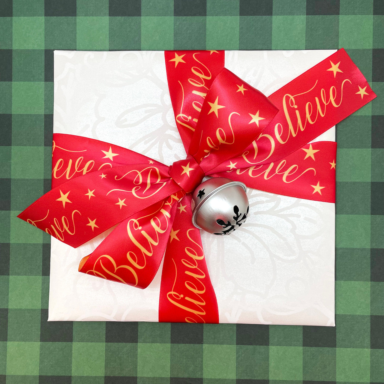 A big fluffy bow made wit our Believe ribbon brings all the magic of the Holiday season to your gifts and Holiday decor! 