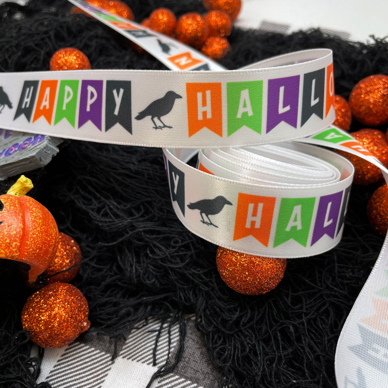 Our colorful Halloween banner ribbon makes the perfect tie for Halloween gifts and treat bags!