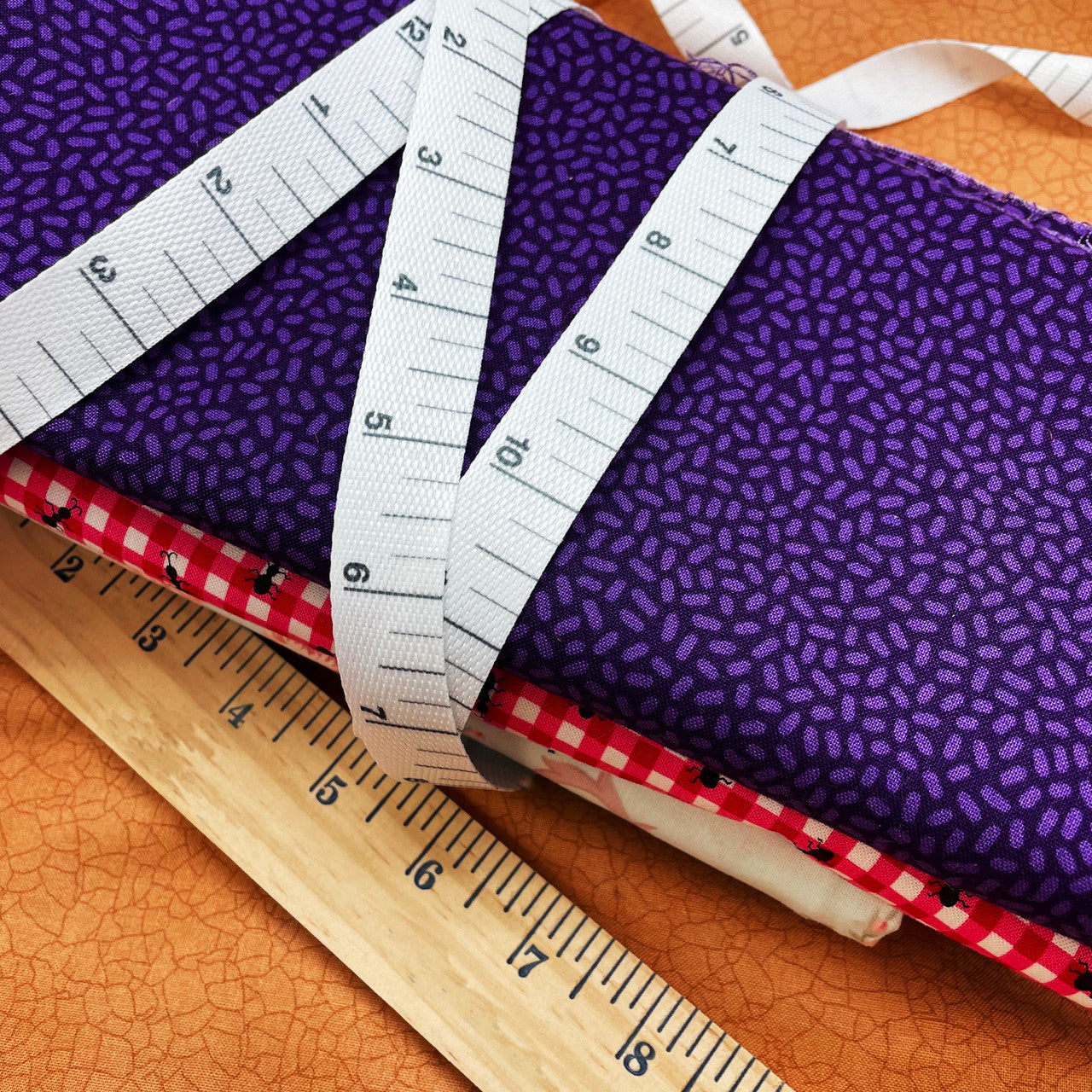 Tie a gift of fabric bundles for your favorite quilter with our measuring tape ribbon! So pretty and fun!