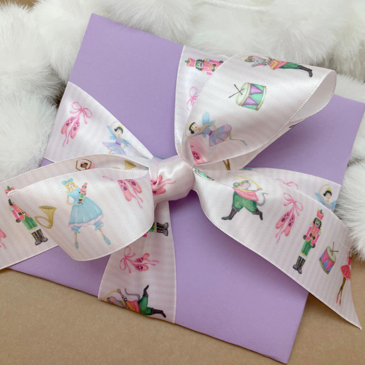 What a beautiful package this lovely Nutcracker ribbon makes for your favorite ballerina! 