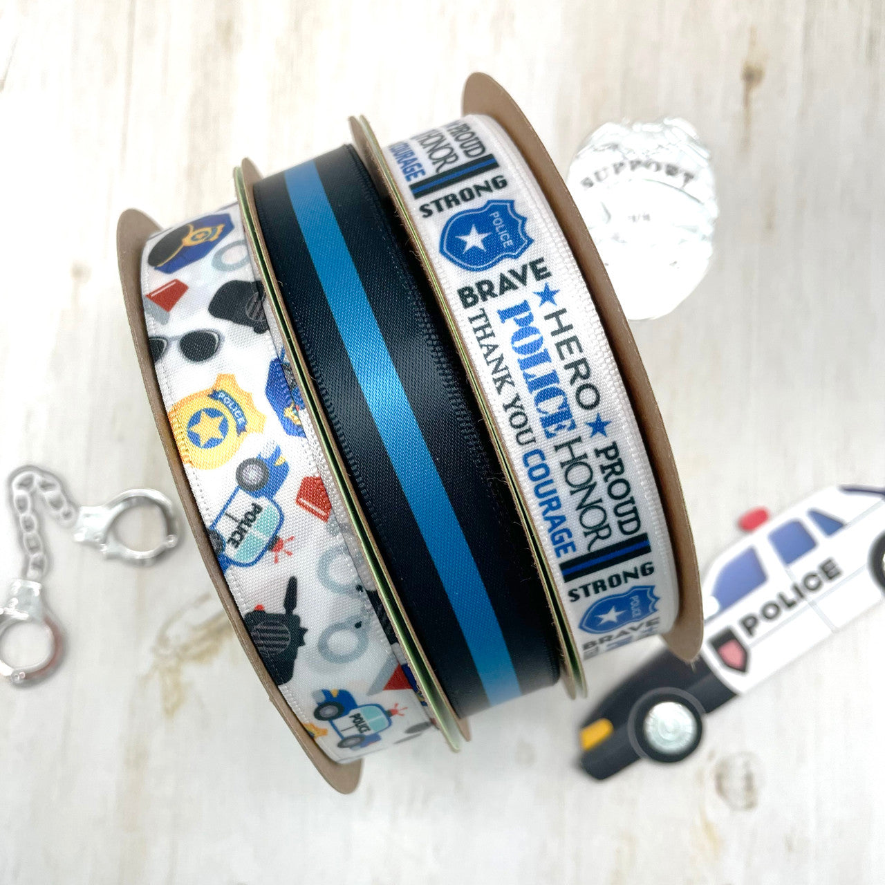 Mix and match our police car ribbon with thin blue line and police word block ribbon for perfect party decor!