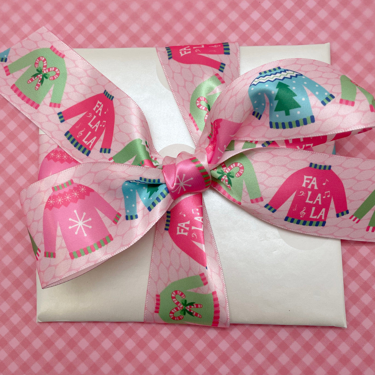 Tie a beautiful bow on a special present for the prettiest gift of the Season! 